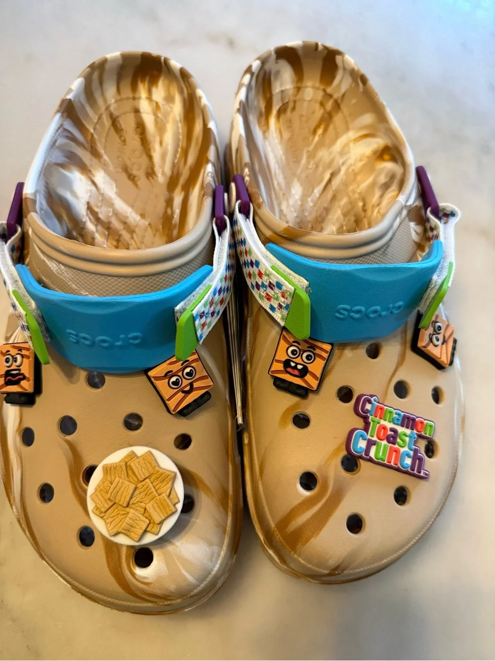 CROCS Beige Marbled Clog with Bright Blue Strap and Multicolor Charms